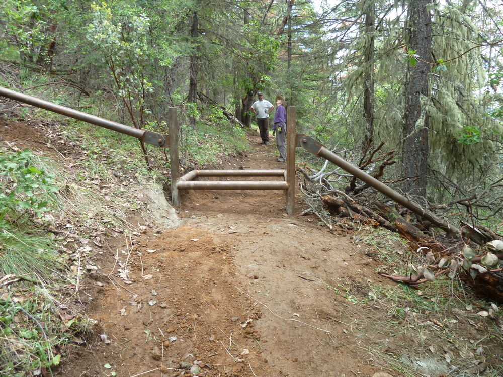 The installed motorcycle barrier near the Wolf Gap Trailhead.